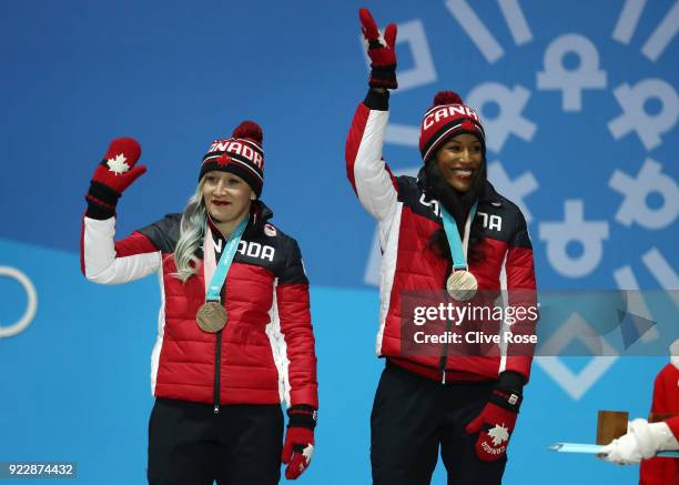Bronze medalists Kaillie Humphries and Phylicia George of Canada celebrate during the medal ceremony for Bobsleigh - Women on day 13 of the...
