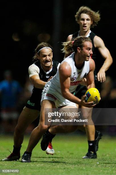 Tim Broomhead of the Magpies runs with the ball during the Collingwood Magpies AFL Intra Club match at the Holden Centre on February 22, 2018 in...