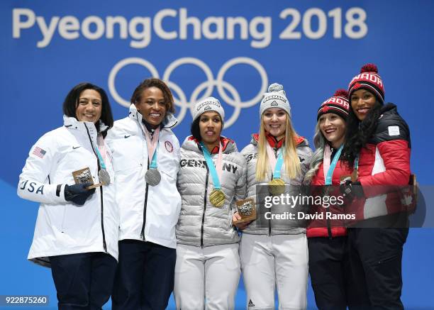 Silver medalists Lauren Gibbs and Elana Meyers Taylor of the United States, gold medalists Lisa Buckwitz and Mariama Jamanka of Germany and bronze...
