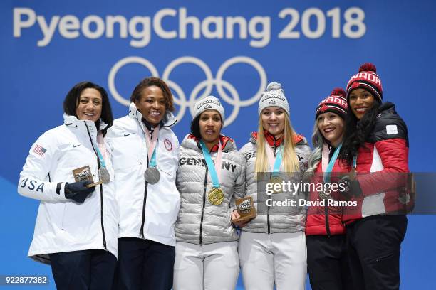 Silver medalists Lauren Gibbs and Elana Meyers Taylor of the United States, gold medalists Lisa Buckwitz and Mariama Jamanka of Germany and bronze...