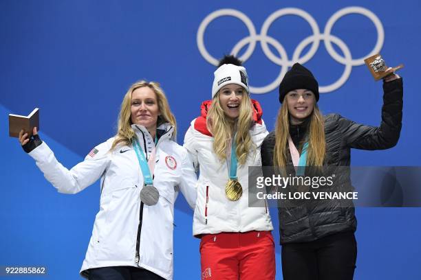 S silver medallist Jamie Anderson, Austria's gold medallist Anna Gasser and New Zealand's bronze medallist Zoi Sadowski Synnott pose on the podium...