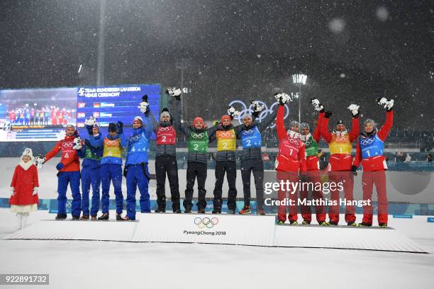 Silver medalists Jan Schmid of Norway, Espen Andersen of Norway, Jarl Magnus Riiber of Norway, Joergen Graabak of Norway, gold medalists Vinzenz...