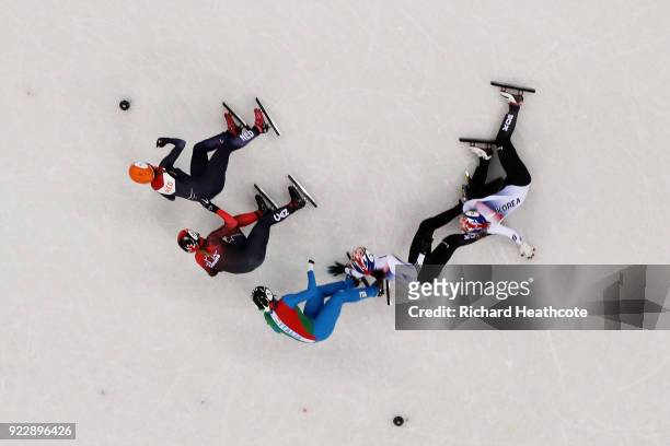 Sukhee Shim of Korea and Minjeong Choi of Korea crash during the Ladies' 1,000m Short Track Speed Skating Final A on day thirteen of the PyeongChang...