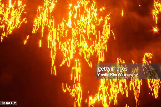 bright irregular lights on smoky dark orange      - westerskov stock pictures, royalty-free photos & images