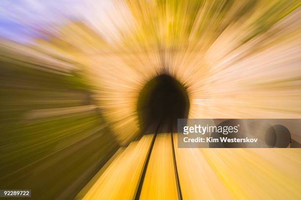 approaching railway tunnel at speed - westerskov stock pictures, royalty-free photos & images