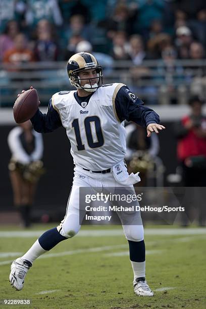 Quarterback Marc Bulger of the St. Louis Rams passes during a NFL game against the Jacksonville Jaguars at Jacksonville Municipal Stadium on October...