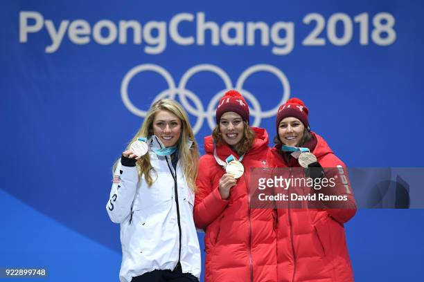 Silver medalist Mikaela Shiffrin of the United States, gold medalist Michelle Gisin of Switzerland and bronze medalist Wendy Holdener of Switzerland...
