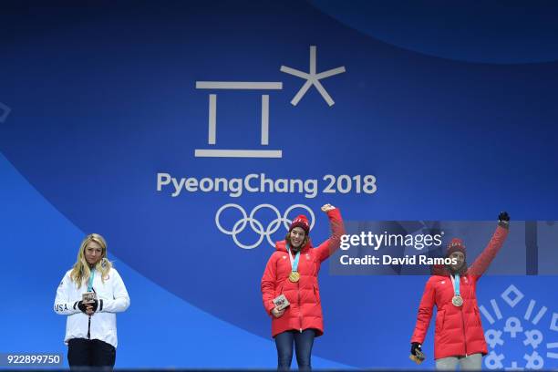 Silver medalist Mikaela Shiffrin of the United States, gold medalist Michelle Gisin of Switzerland and bronze medalist Wendy Holdener of Switzerland...