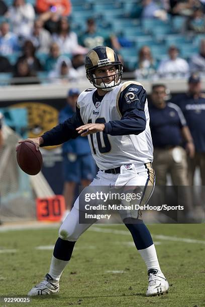 Quarterback Marc Bulger of the St. Louis Rams passes during a NFL game against the Jacksonville Jaguars at Jacksonville Municipal Stadium on October...