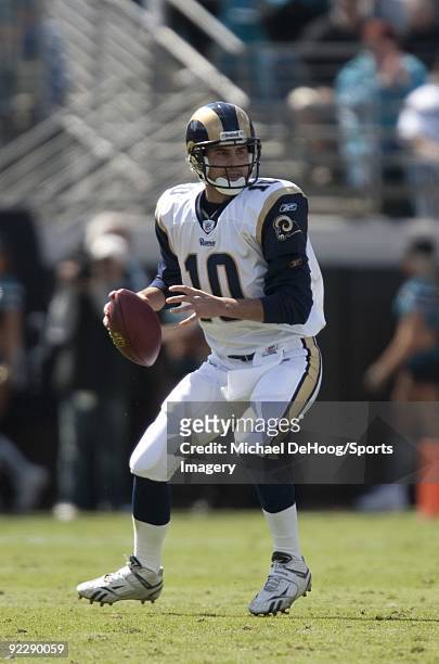 Quarterback Marc Bulger of the St. Louis Rams passes during a NFL game against the Jacksonville Jaguars at Jacksonville Municipal Stadium on October...