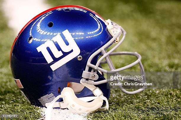 Eli Manning of the New York Giants' helmet rests on the field prior to their NFL game against the New Orleans Saints at the Louisiana Superdome on...