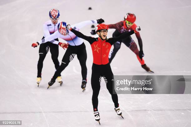 Dajing Wu of China celebrates winning gold in the Men's 500m Short Track Speed Skating Final A on day thirteen of the PyeongChang 2018 Winter Olympic...