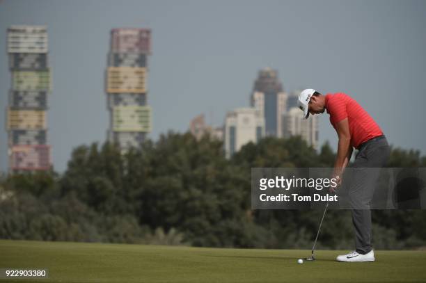 Charlie Ford of England putts on the 7th green during the first round of the Commercial Bank Qatar Masters at Doha Golf Club on February 22, 2018 in...