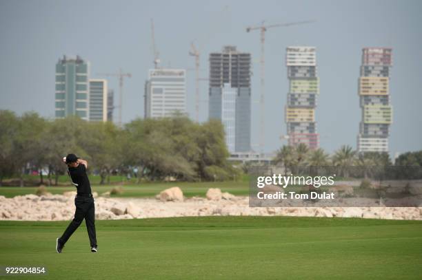 Pontus Widegren of Sweden hits an approach shot on the 18th hole during the first round of the Commercial Bank Qatar Masters at Doha Golf Club on...