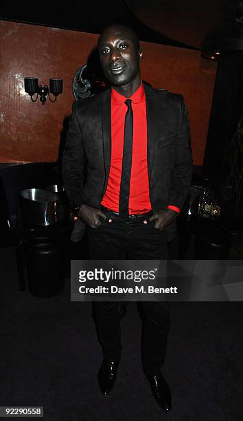 Fashion designer Ozwald Boateng attends the afterparty following the UK film premiere of 'Dead Man Running', at Alto on October 22, 2009 in London,...