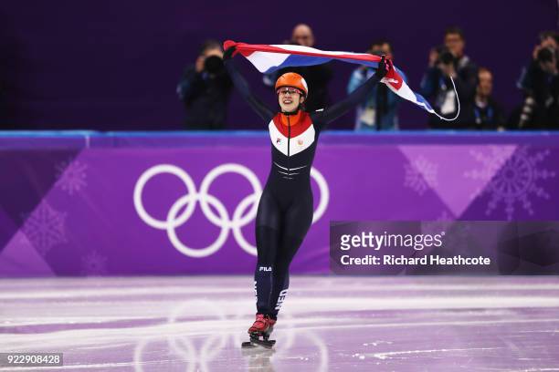 Suzanne Schulting of the Netherlands celebrates winning gold in the Ladies' 1,000m Short Track Speed Skating Final A on day thirteen of the...