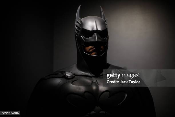 Batman costume from the 1995 Batman Forever film worn by Val Kilmer and designed by Rob Ringwood and Ingrid Ferrin is on display at the DC Comics...