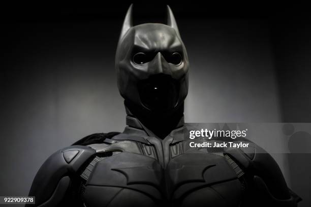 Batman costume from the 2012 Dark Knight Rises film worn by Christian Bale and designed by Lindy Hemming is on display at the DC Comics Exhibition:...