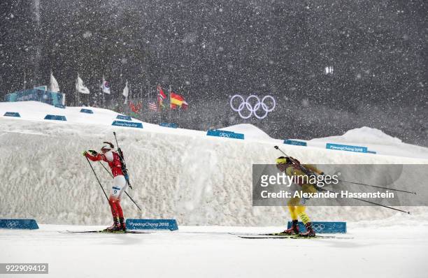 Monika Hojnisz of Poland and Linn Persson of Sweden compete during the Women's 4x6km Relay on day 13 of the PyeongChang 2018 Winter Olympic Games at...