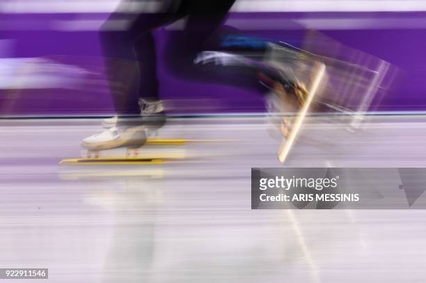 Athletes compete in the men's 5,000m relay short track speed skating B final event during the Pyeongchang 2018 Winter Olympic Games, at the Gangneung...