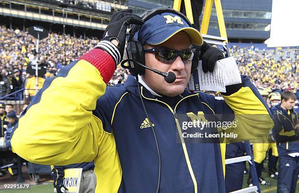 Rich Rodriguez head football coach of the University of Michigan gets ready for the game against the Delaware State Hornets at Michigan Stadium on...