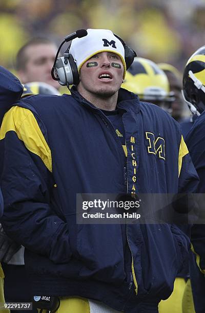 Tate Forcier of the Michigan Wolverines watches the replay on the video board during fourth quarter against the Delaware State Hornets at Michigan...