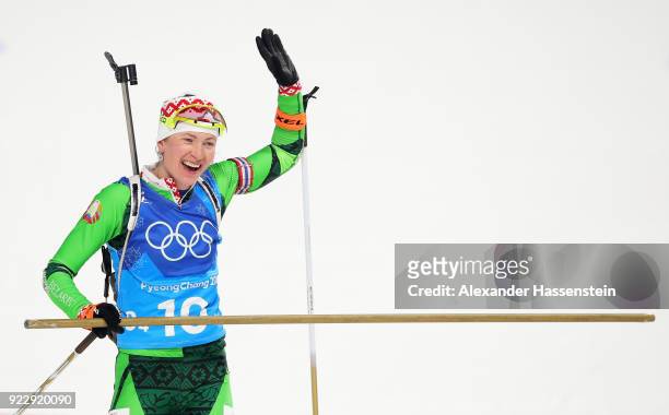 Darya Domracheva of Belarus celebrates as she wins gold during the Women's 4x6km Relay on day 13 of the PyeongChang 2018 Winter Olympic Games at...