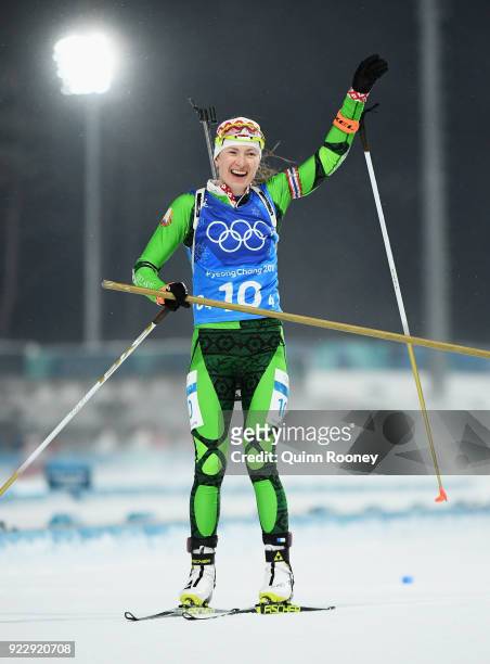 Darya Domracheva of Belarus celebrates as she wins gold during the Women's 4x6km Relay on day 13 of the PyeongChang 2018 Winter Olympic Games at...