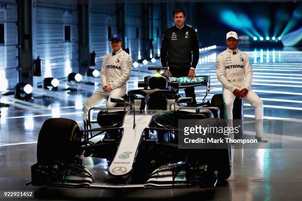 Valtteri Bottas of Finland and Mercedes GP, Mercedes GP Executive Director Toto Wolff and Lewis Hamilton of Great Britain and Mercedes GP pose for a...