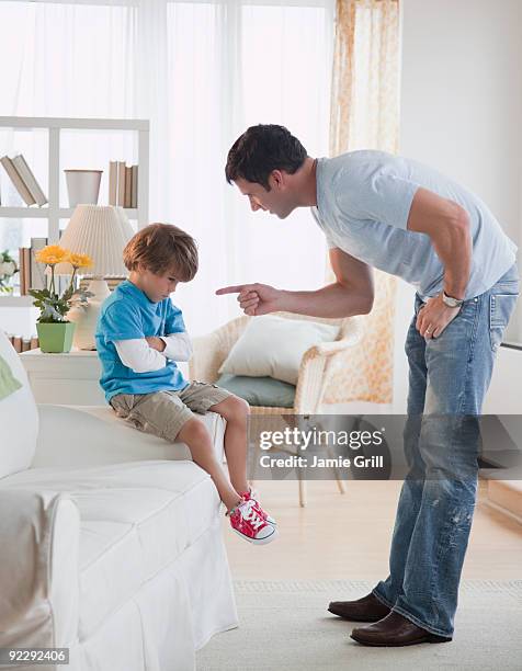 father disciplining son - 罰 ストックフォトと画像