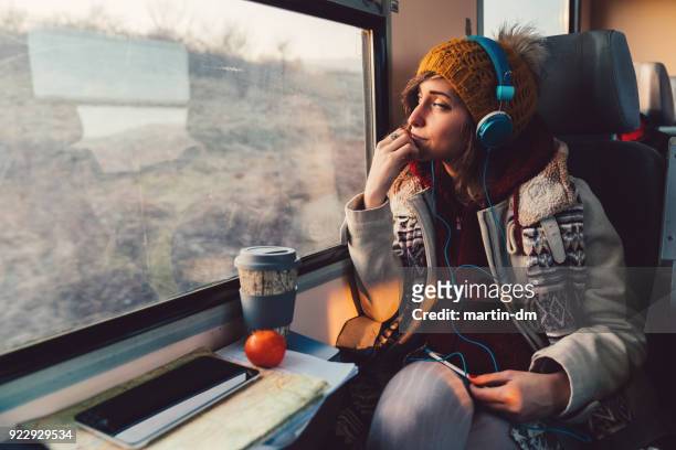 viaggiatore in viaggio con il treno - journey foto e immagini stock