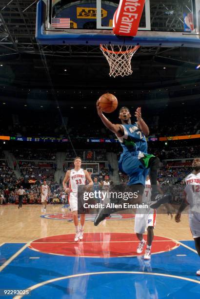 Corey Brewer of the Minnesota Timberwolves goes up for a shot attempt past Will Bynum of the Detroit Pistons in a preseason game at the Palace of...