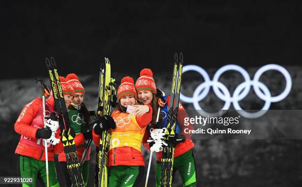Gold medalists Nadezhda Skardino, Iryna Kryuko, Dzinara Alimbekava and Darya Domracheva of Belarus take a selfie photograph as they celebrate on the...