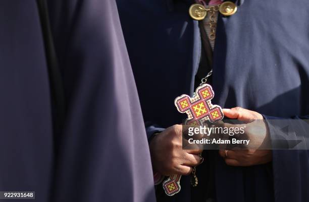 An Ethiopian Orthodox priest demonstrates along with other Ethiopians living in Germany against the Ethiopian government on February 22, 2018 in...