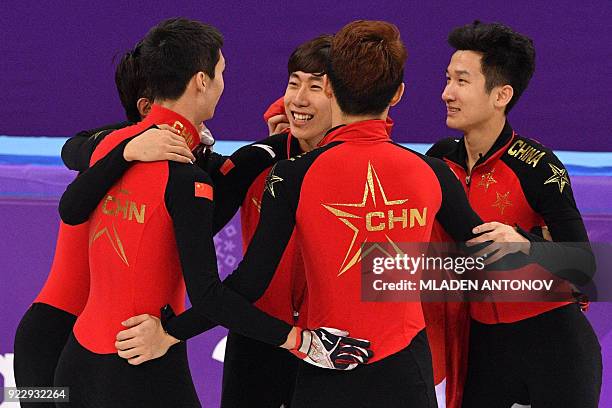 Team China celebrate the Silver medal after the men's 5,000m relay short track speed skating A final event during the Pyeongchang 2018 Winter Olympic...