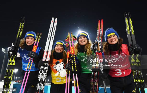 Silver medalists Hanna Oeberg, Anna Magnusson, Mona Brorsson and Linn Persson of Sweden during the Women's 4x6km Relay on day 13 of the PyeongChang...