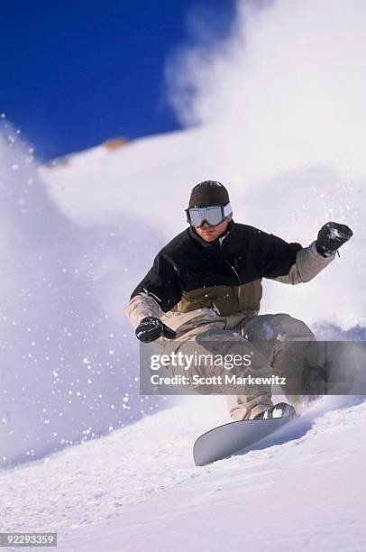 man snowboarding, snowbird, utah. - snowbird lodge stock pictures, royalty-free photos & images