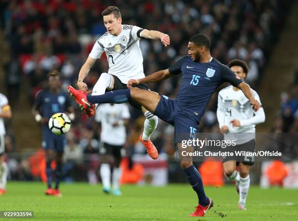 November 2017 - International Football Friendly - England v Germany - Joe Gomez of England stretches to intercept Julian Draxler of Germany .