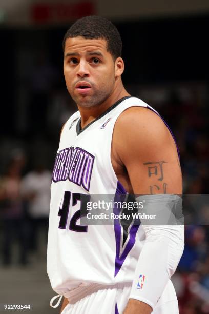 Sean May of the Sacramento Kings looks on during a preseason game against the Golden State Warriors at Arco Arena on October 17, 2009 in Sacramento,...