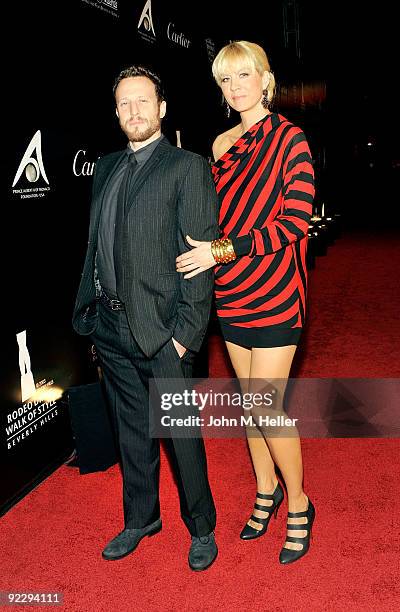 Actor Bodhi Elfman and actress Jenna Elfman attend the Rodeo Drive Walk Of Style held on Rodeo Drive on October 22, 2009 in Beverly Hills, California.