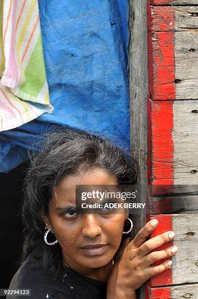 To go with Australia-Indonesia-immigration-refugees-SriLanka by Arlina Arshad Sri Lankan asylum-seeker Shanti talks to journalists from her boat...