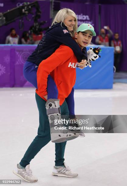 Gold medalist Shaolin Sandor Liu of Hungary celebrates with girlfriend Elise Christie of Great Britain following the Short Track Skating Men's 5000m...