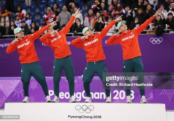 Gold medalists Shaoang Liu, Shaolin Sandor Liu, Viktor Knoch and Csaba Burjan of Hungary celebrate during the victory ceremony after the Short Track...