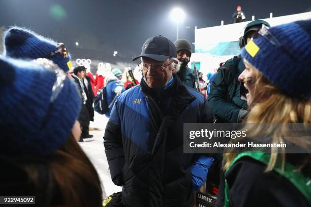 King Carl Gustaf of Sweden celebrates with silver medalists Sweden after during the Women's 4x6km Relay on day 13 of the PyeongChang 2018 Winter...