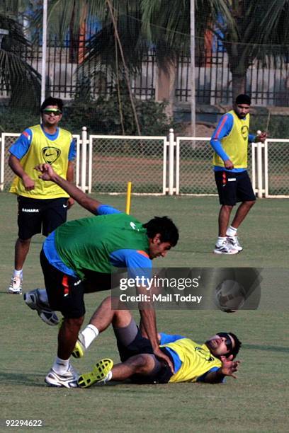 Indian cricket team players Yuvraj Singh and Harbhajan Singh practice with other team members for the upcoming India- Australia one-day series in...