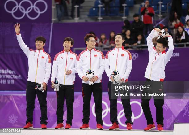 Silver medalists Dajing Wu, Tianyu Han, Hongzhi Xu, Dequan Chen and Ziwei Ren of China celebrate during the victory ceremony after the Short Track...
