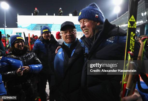 King Carl Gustaf of Sweden celebrates with head coach Wolfgang Pichler after the Women's 4x6km Relay on day 13 of the PyeongChang 2018 Winter Olympic...