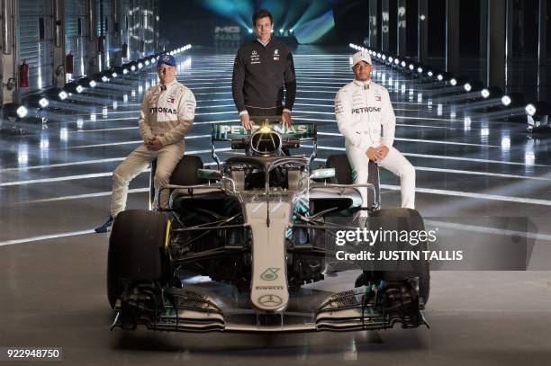 Mercedes AMG Petronas Formula One drivers Finland's Valtteri Bottas and Britain's Lewis Hamilton , with Mercedes AMG Petronas Formula One Team...