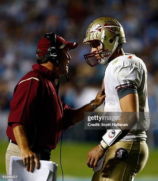 Florida State Seminoles Offensive Coordinator Jimbo Fisher speaks with his quarterback Christian Ponder during their game against the North Carolina...