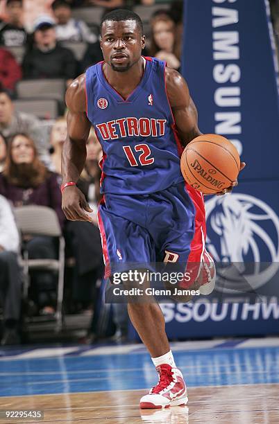 Will Bynum of the Detroit Pistons moves the ball against the Dallas Mavericks during the preseason game at the American Airlines Center on October...